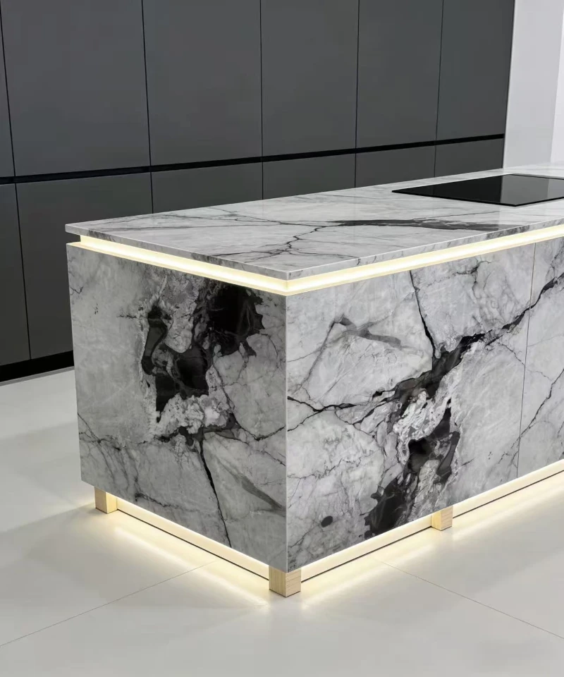 Da Vinci marble kitchen island countertop with bookmatched pattern and integrated LED backlighting