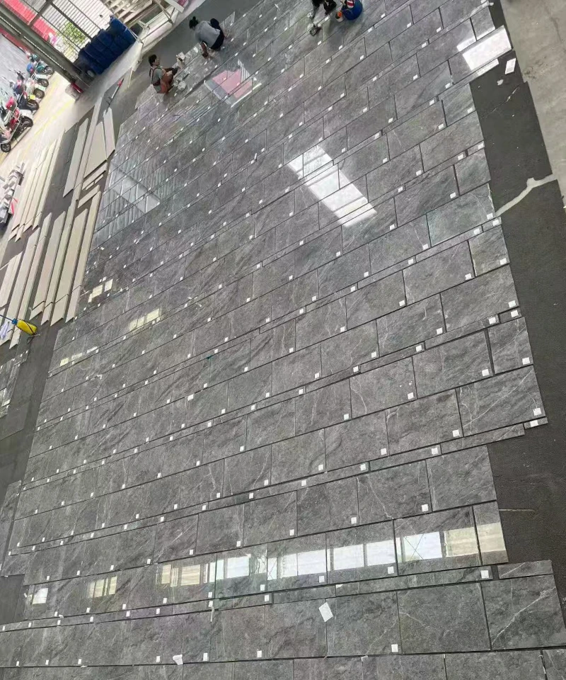 grey marble dry lay inspection with full slab layout and numbering for precise installation