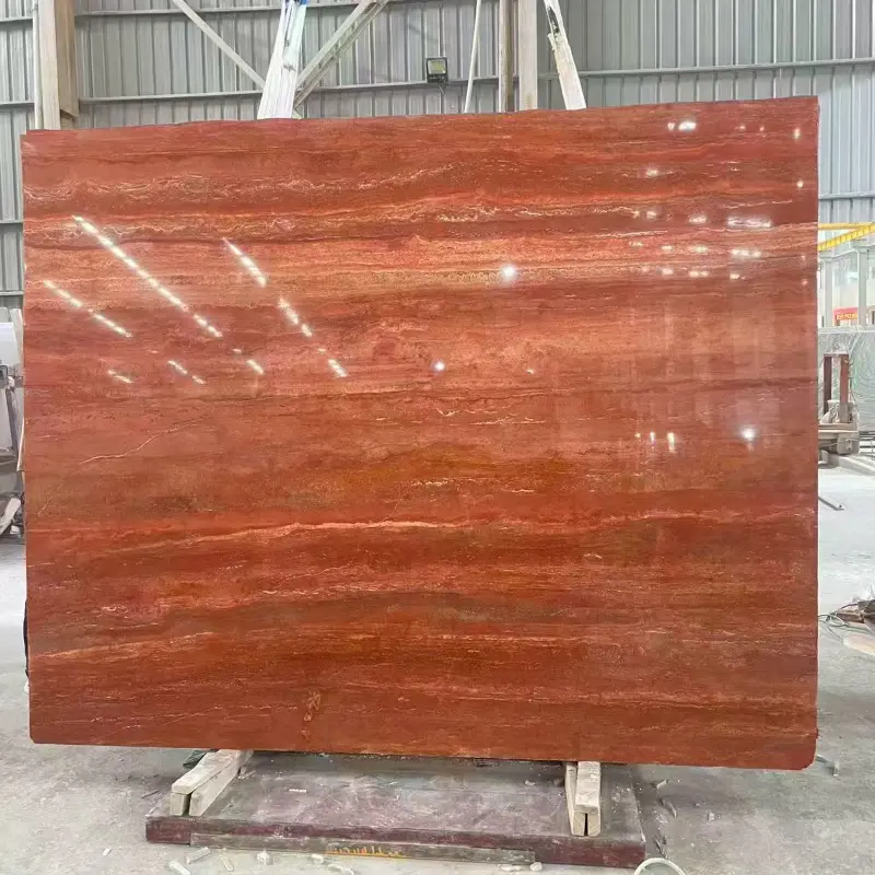 Polished filled Red Travertine slab with warm red and gold veins