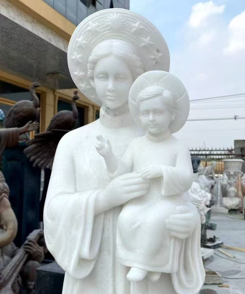 Beautiful white marble statue of Virgin Mary and Child, hand-carved religious sculpture, outdoor garden art